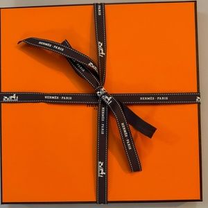 Empty Hermes Scarf Box with Brown Ribbon, Tissue paper, and scarf care sticker